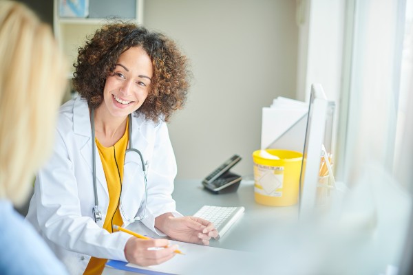 Doctor talking to patient at appointment